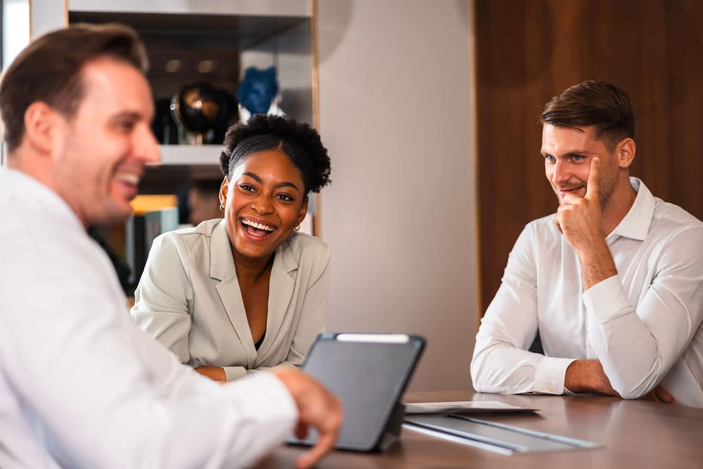 An advisor in conversation with clients