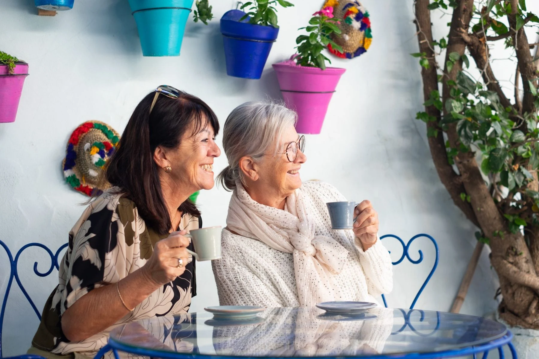 Two women talking over coffee